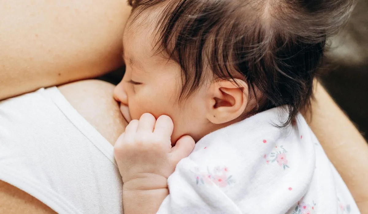 Baby crying while breastfeeding