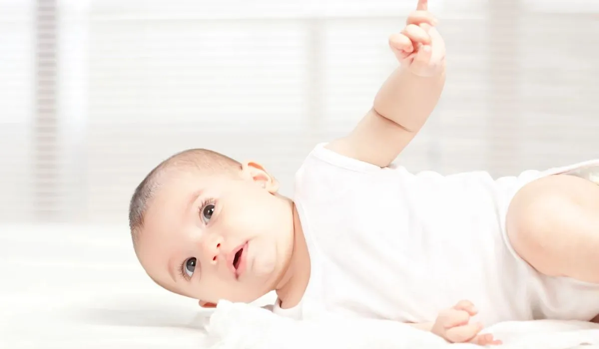 Baby crawling on a soft rug